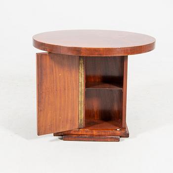 An Art Deco walnut coffee table.