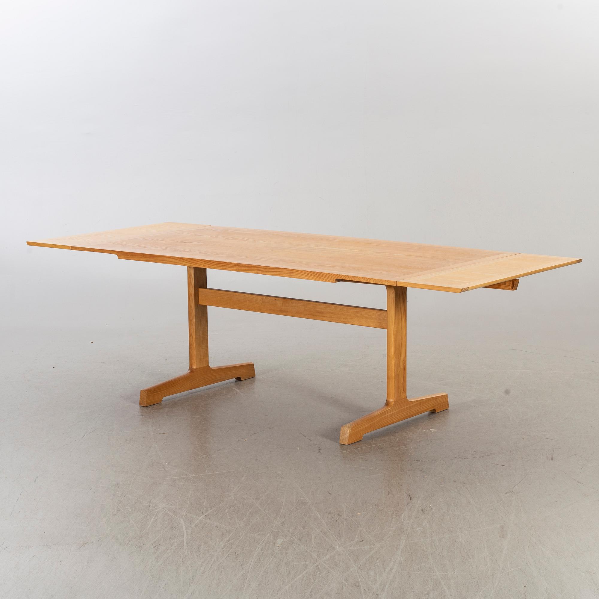 A late 20th century “Spisestue 594”, Ditte & Adrian Heath, France & Son dining table with 6 chairs.