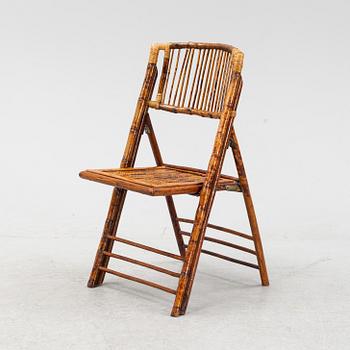 A Chinese spotted bamboo folding chair, late Qing dynasty, circa 1900.