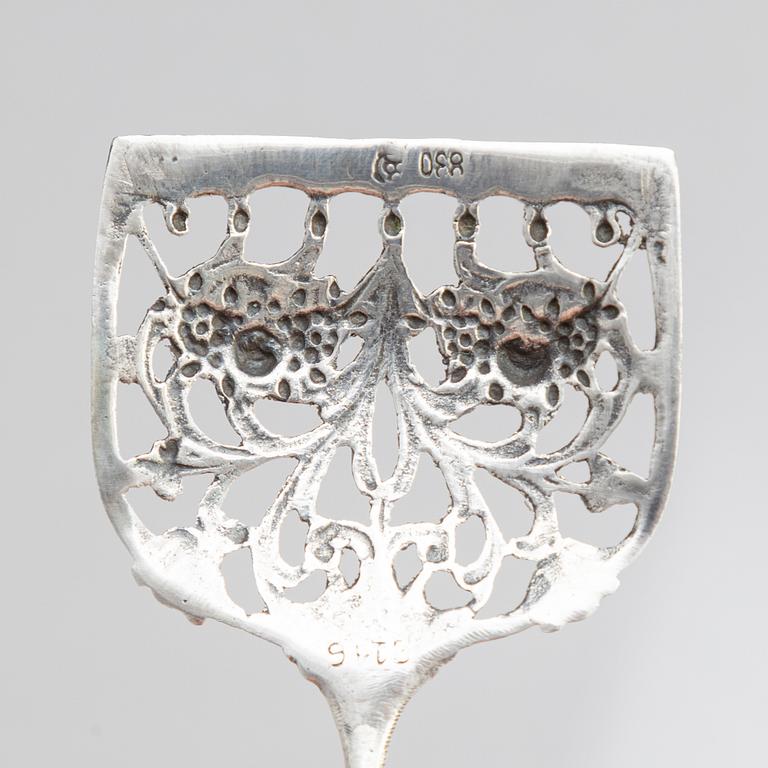 Two Silver Serving Spoons, including a Rococo-Revival spoon with mark PR Hinnerup, Denmark 1851.