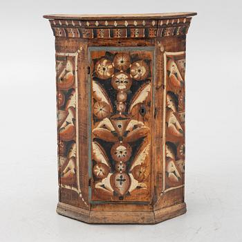 A Swedish traditional painted corner cabinet, Dalarna, 18th-/19th century.