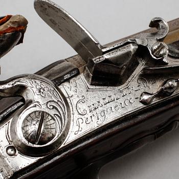 A flintlock gun, probably 18th century.