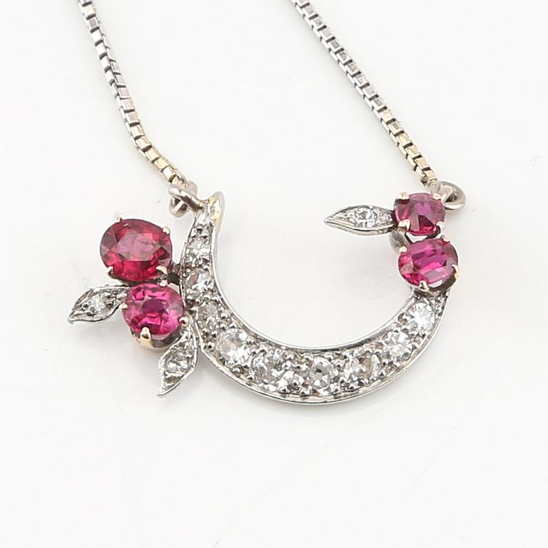 Necklace 18K white gold with faceted rubies and diamonds.