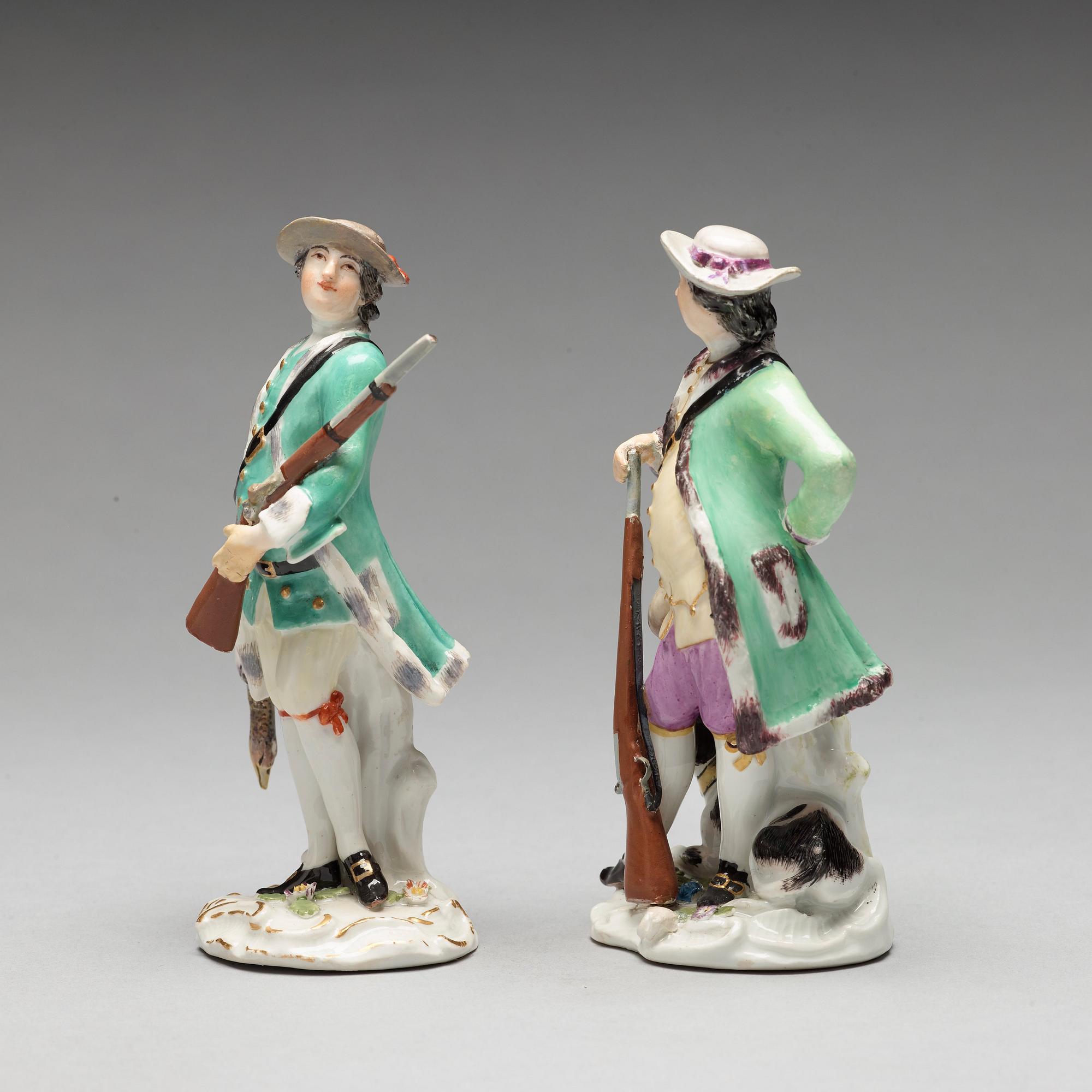Two Meissen porcelain figures of huntsmen, 18th Century.