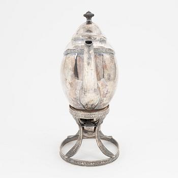 An Empire silver coffee pot with rechaud, first half of the 19th century.