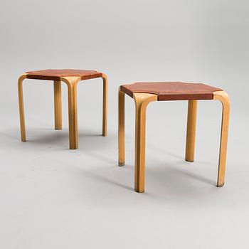 ALVAR AALTO, A PAIR OF X-LEG STOOLS. Model X601. Designed in 1954.