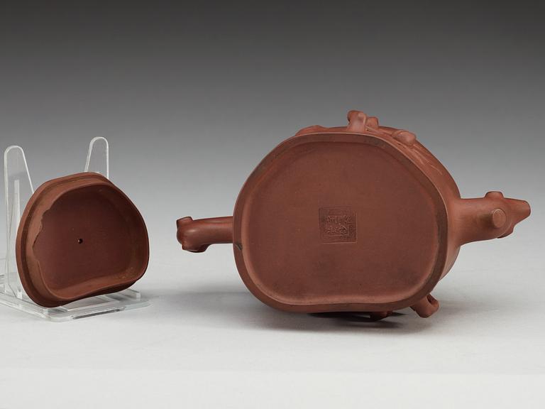 A Chinese Yixing tea pot with cover, 20th Century.