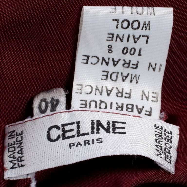 CÉLINE, a burgundy colored wool skirt.