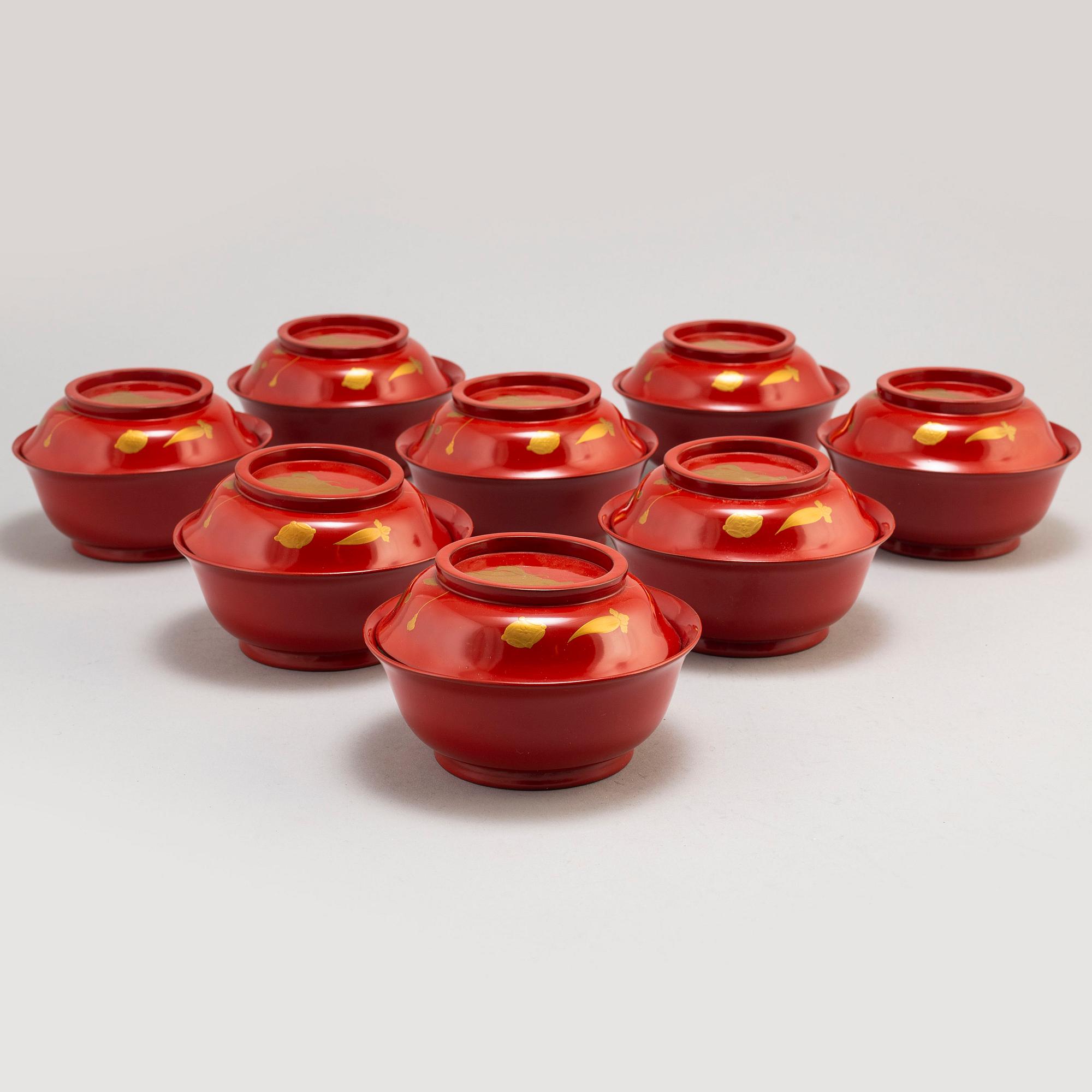 Eight lacquered bowls with covers, Japan, 20th century.