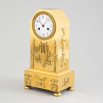 A circa 1800 brass mantel clock.