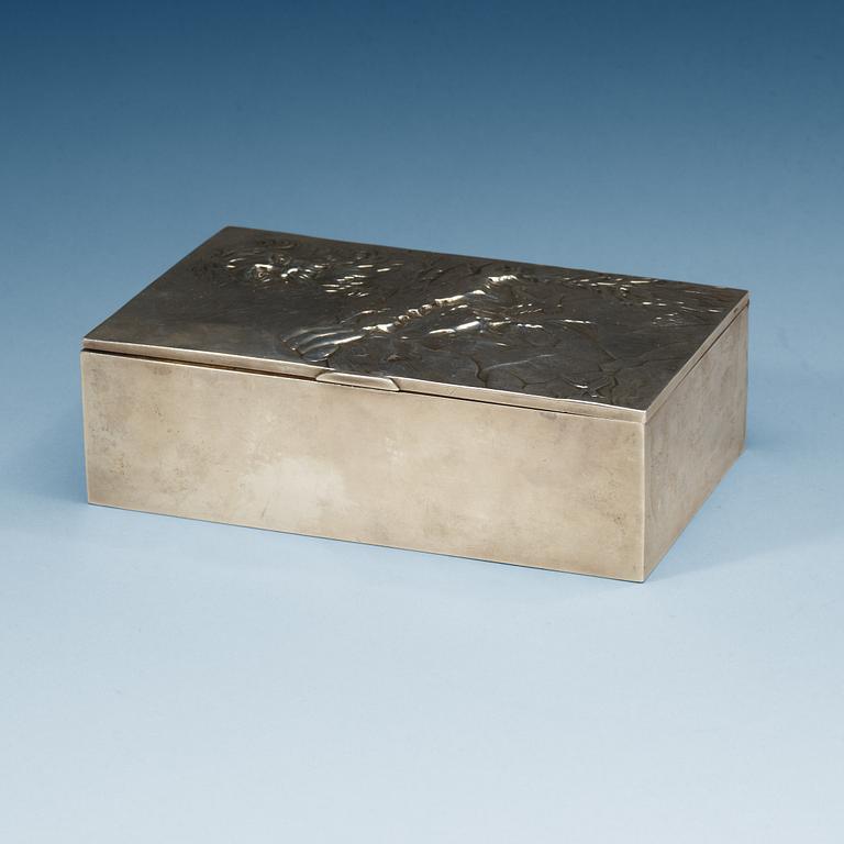 A Russian 20th century parcel-gilt cigarr-box, makers mark of  Adrian T. Ivanov, Moscow 1908-1917.