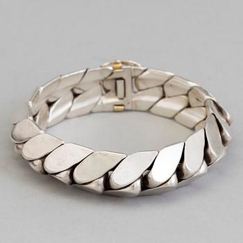 HERMÈS bracelet in silver and 18K gold.