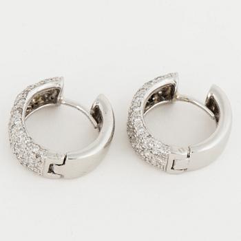 Platinum and brilliant-cut diamond earrings.