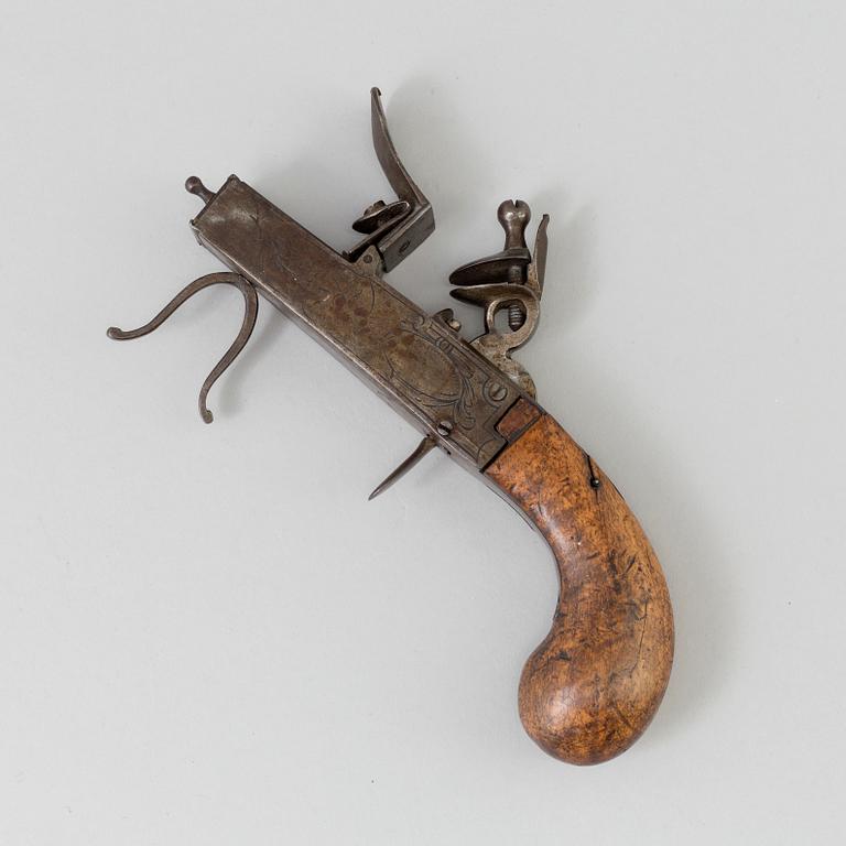 A FLINTLOCK LIGHTER, iron, 18th century.