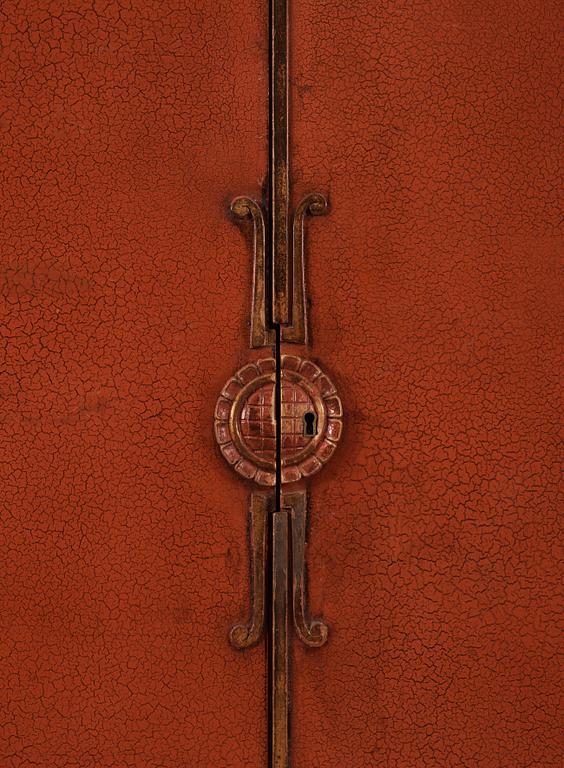 An Axel Einar Hjorth red lacquered wardrobe, 'Åbo', Nordiska Kompaniet 1929.