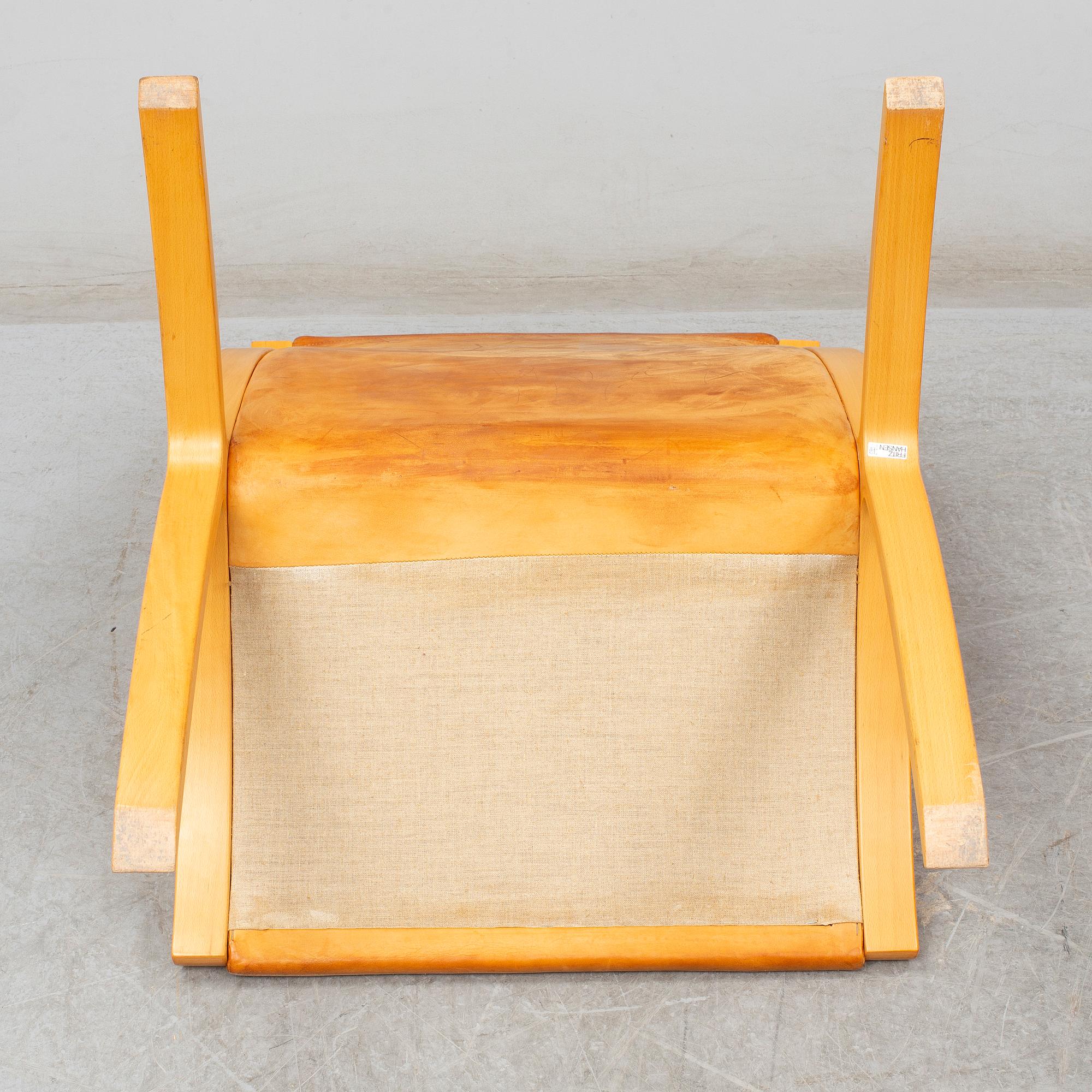 PETER HVIDT & ORLA MØLGAARD NIELSEN, an 'X-stolen' easy chair from Fritz Hansen, Denmark.