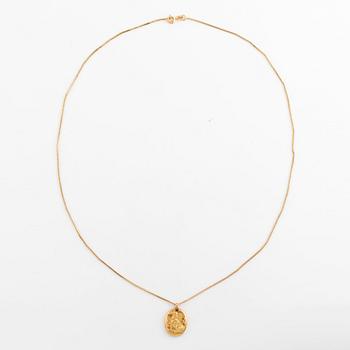 A Cartier Leo zodiac pendant.
