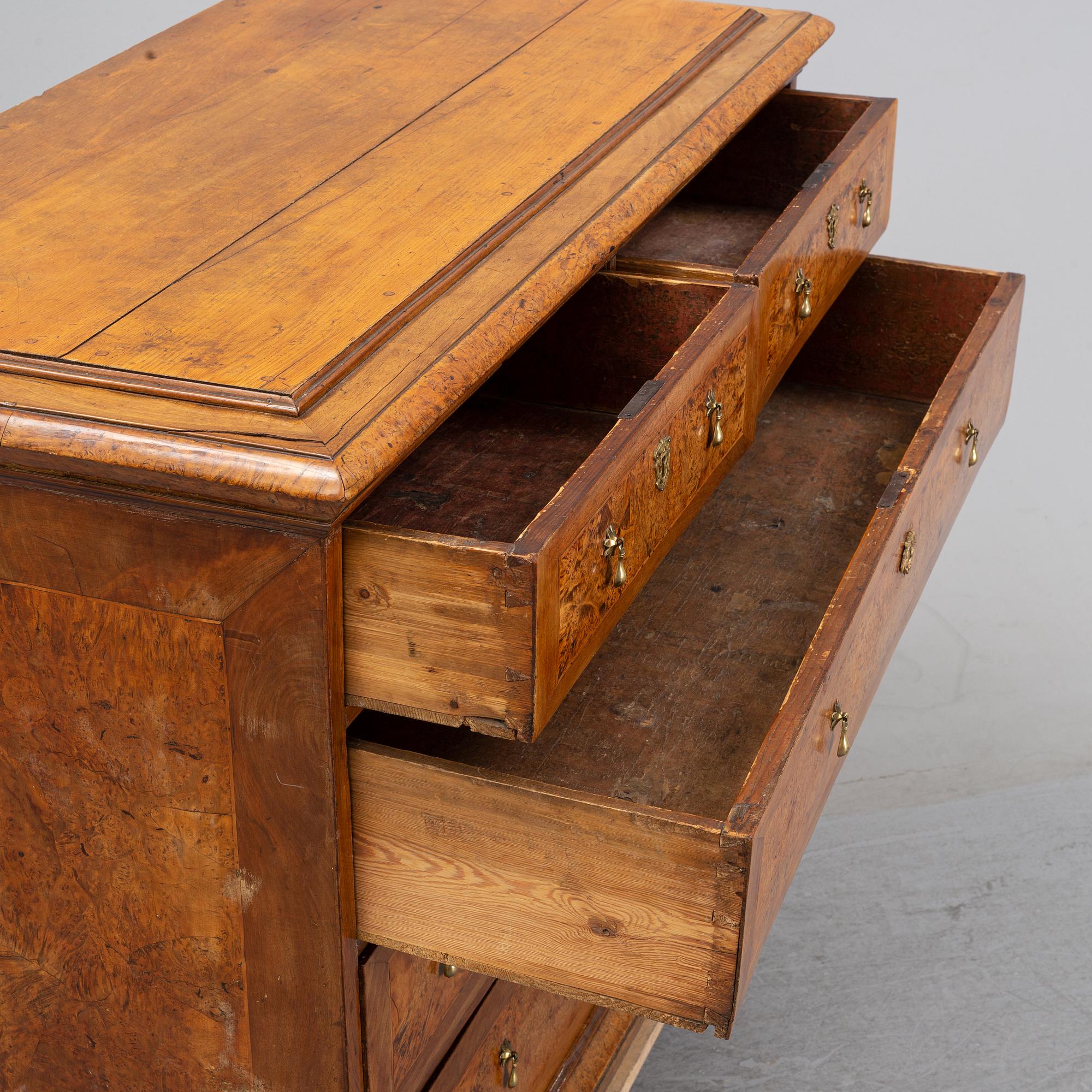 A Swedish root veneered late baroque chest of drawers, first half of the 18th century.