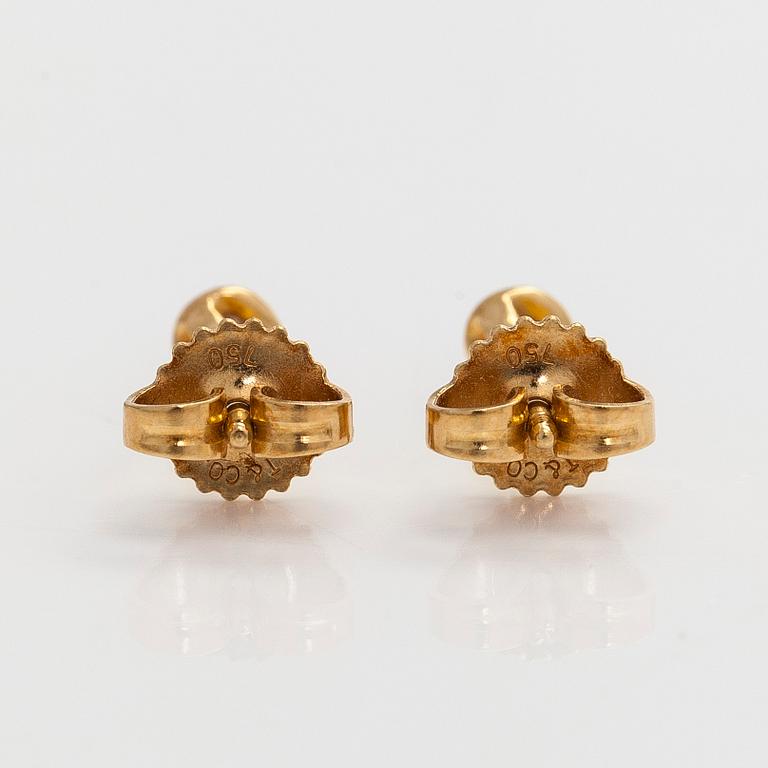 Tiffany & Co, Elsa Peretti, a pair of 18K gold 'Diamonds by The Yard' earrings with brilliant-cut diamonds.