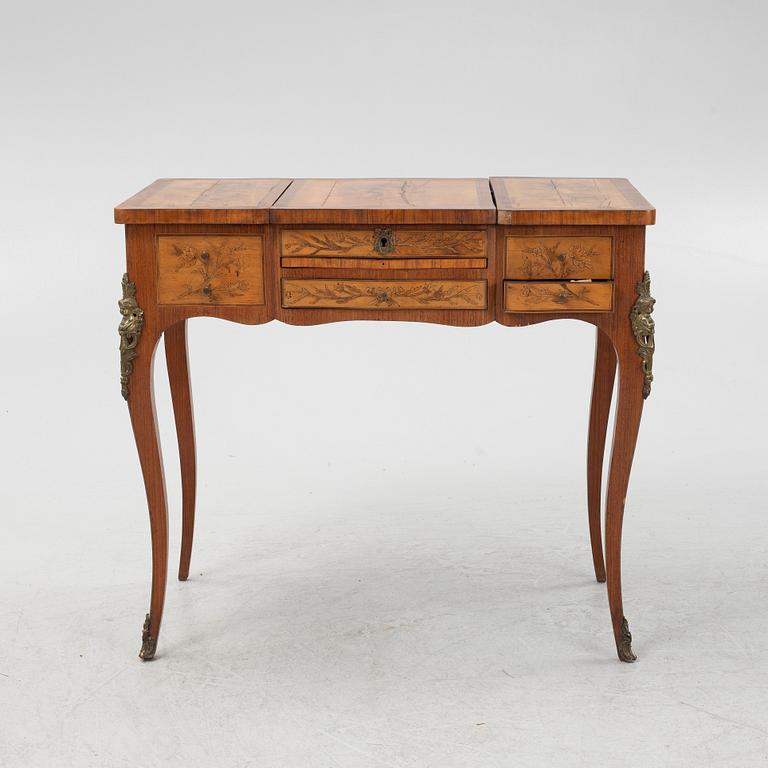 A Louis XV style dressing table, early 20th Century.