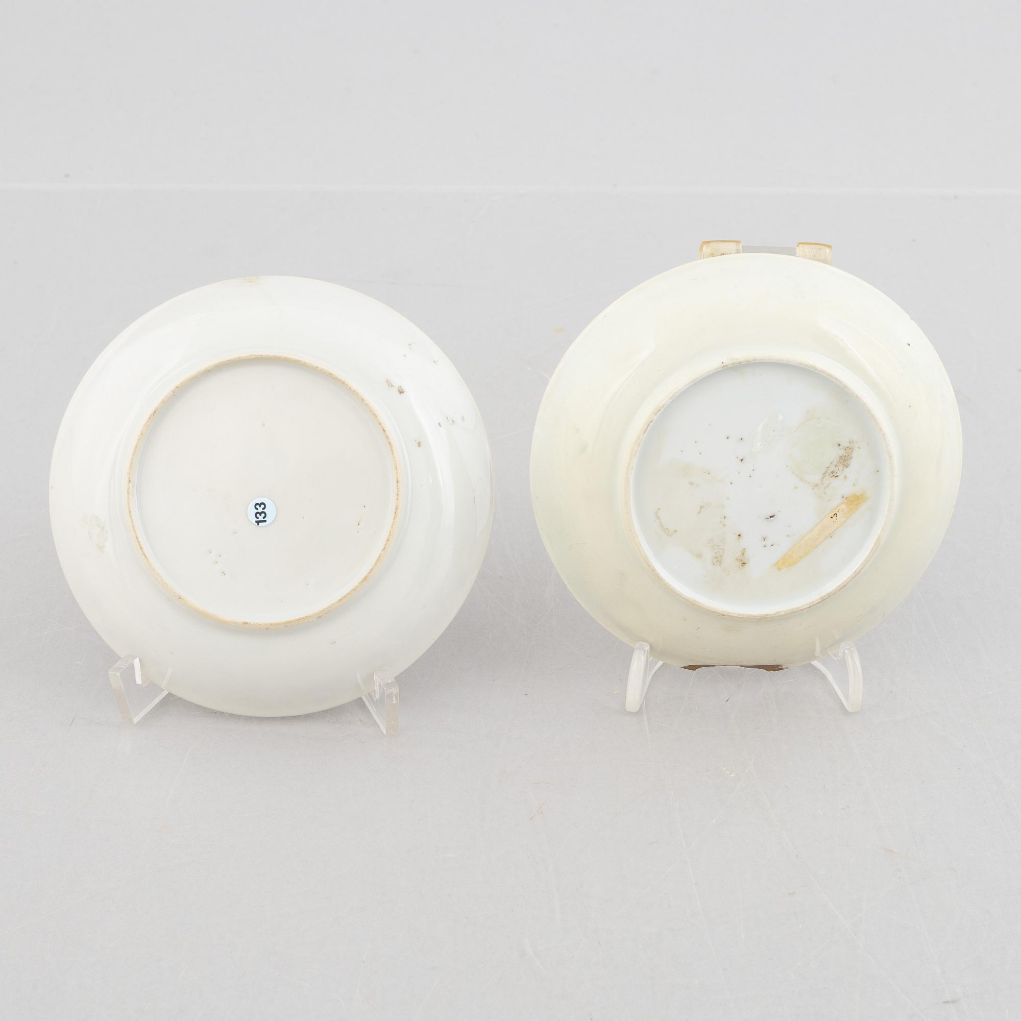 Two Chinese grisaille porcelain saucers, Qing dynasty, Qianlong (1736-95).