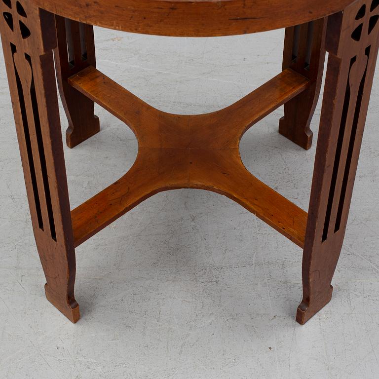 A copper and mahogany table by Nordiska kompaniet.