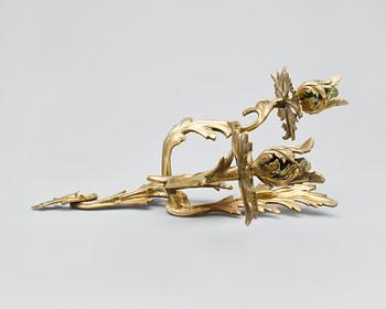 APPLIQUER, ett par, rokokostil, 1800/1900-tal.