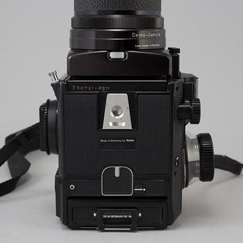 A Rolleiflex SL 66 E camera no 902510006 with three lenses.