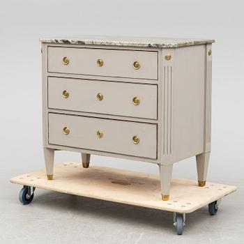 an early 20th century chest of drawers.