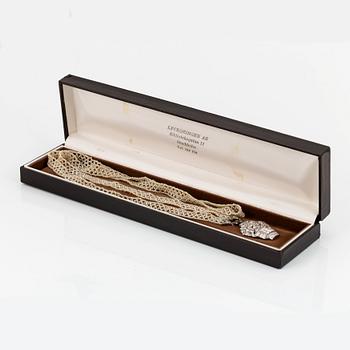 A diamond and pearl sautoir.