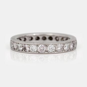 1142. A fancy pink and colourless diamond eternity ring.