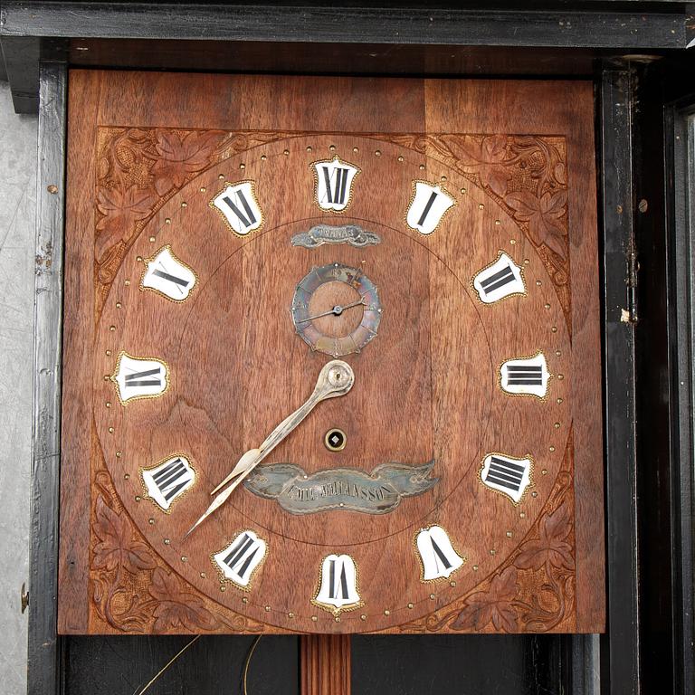 A lacquerwork wall pendulum clock, late 19th Century.