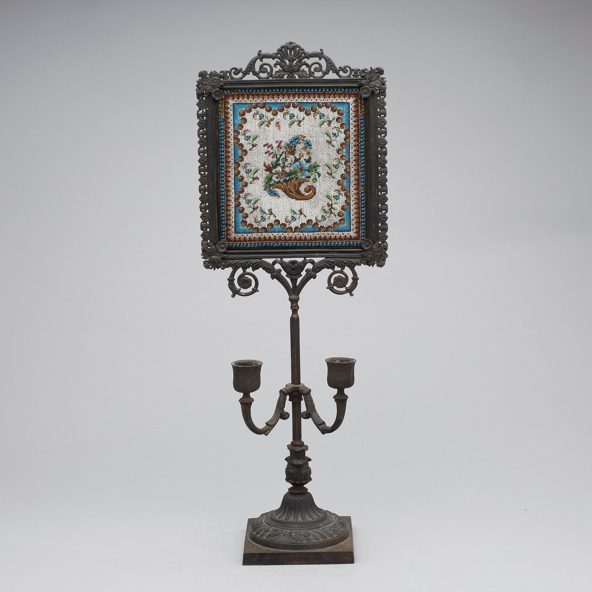 LÄSLJUSSTAKE, senempire, 1800-tal, gjutjärn.