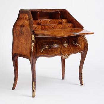 A rosewood, walnut, and gilt brass-mounted rococo secretaire by J. H. Reimers (master in Stockholm 1754-73).