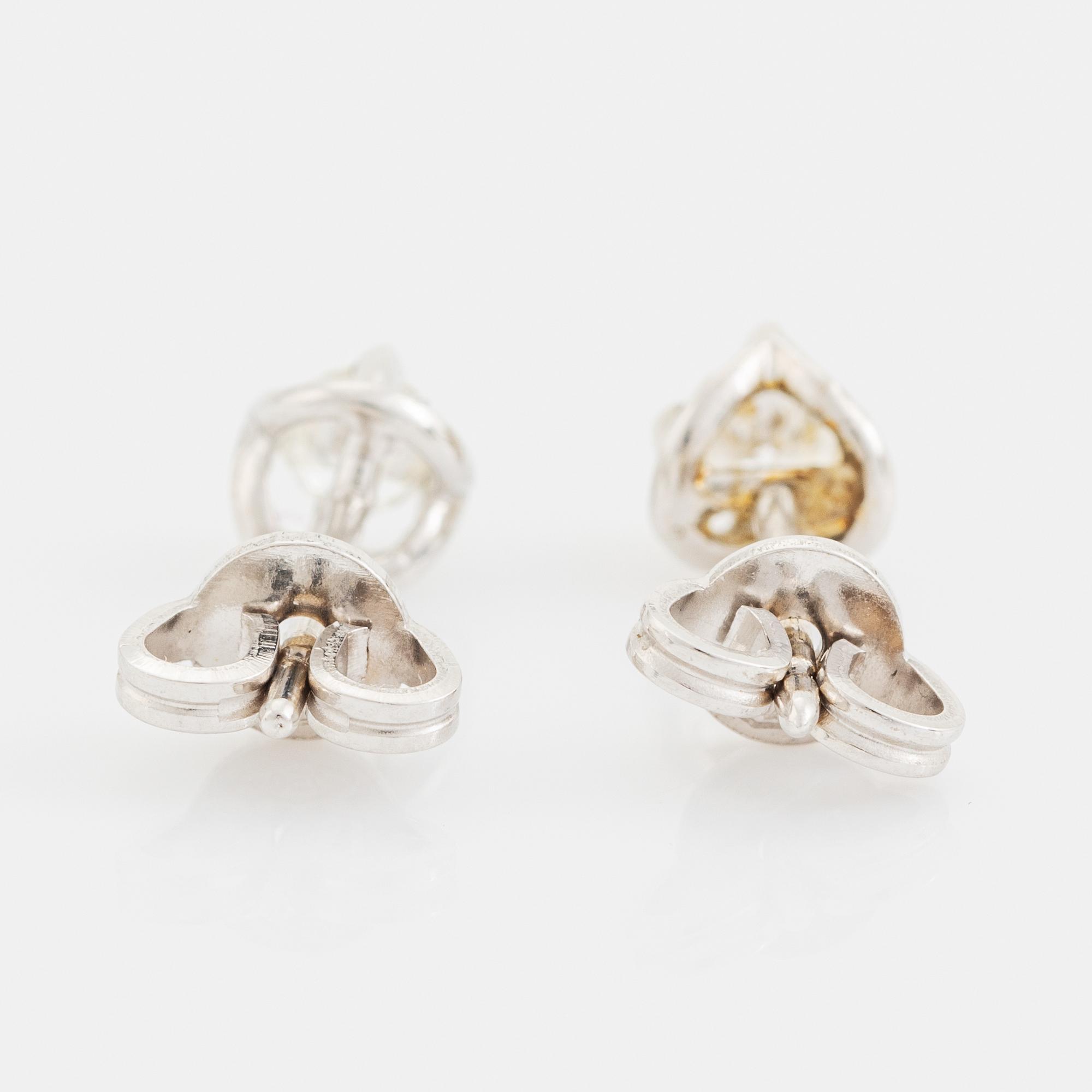 Brilliant cut diamond earrings, total ca 0,36 ct.