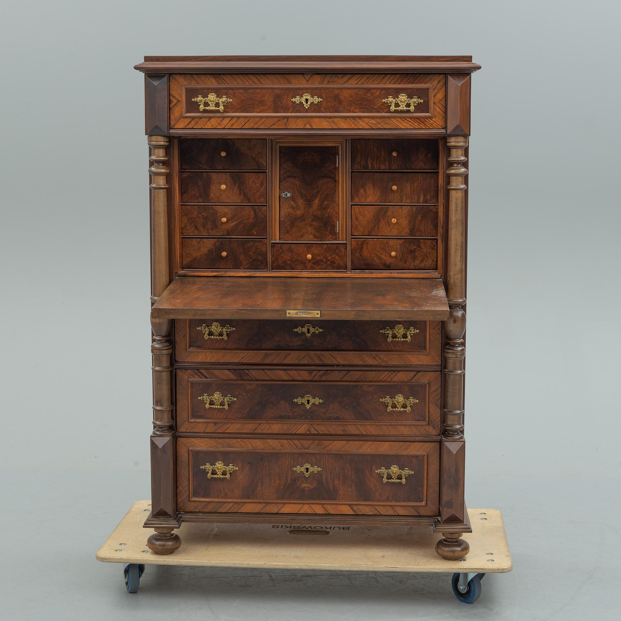 A late 19th century renaissance style secretaire.