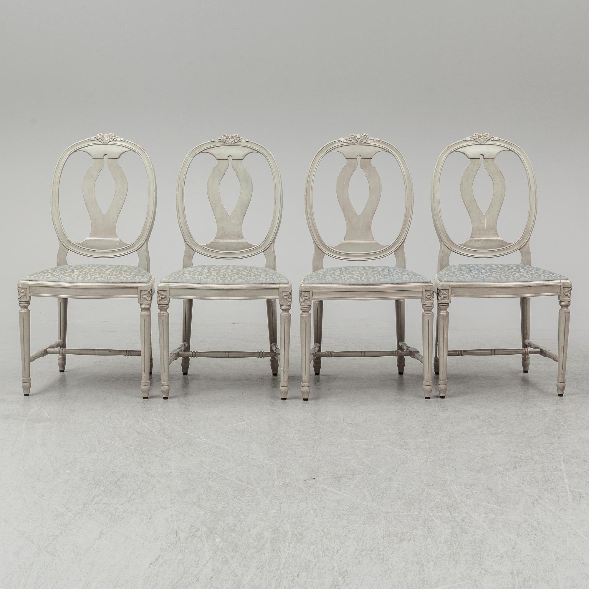A dining table and four chairs, gustavian style, late 20th century.