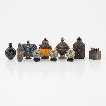 Ten snuff bottles and small bowls, metal, cloisonné and lacquer, China, 20th century.