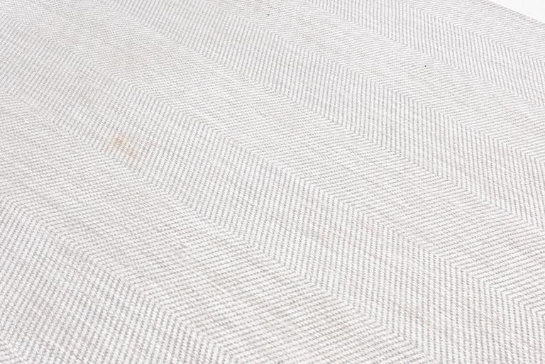 Rug, flat weave, 'Osaka Chevron', Minotti, Italy, approximately 282 x 225 cm.