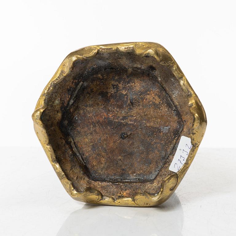 A silvered brass prayer container, Tibet, 20th century.