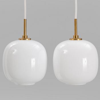 Vilhelm Lauritzen, a pair of  'VL45 Radiohus Pendants', Louis Poulsen, Denmark.