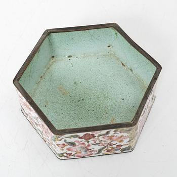 A Chinese enamel on copper teapot and an enamel box with carved wooden cover, Qing dynasty, 18th century.