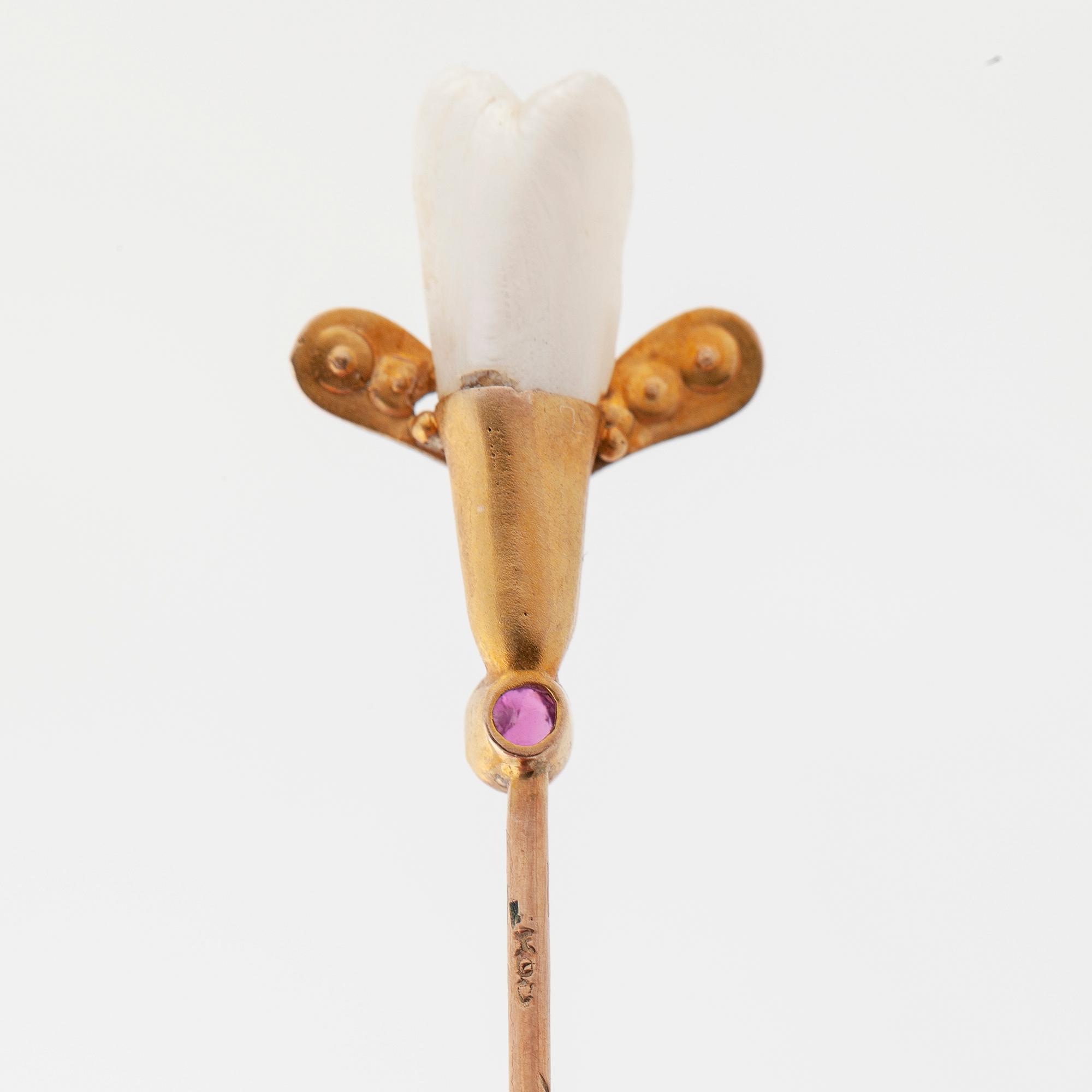 Two pins set with cultured pearls and a synthetic ruby and a synthetic sapphire.