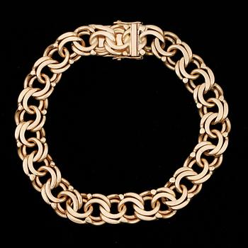 ARMBAND,  18k guld. Stockholm, 1952. Vikt 44g.
