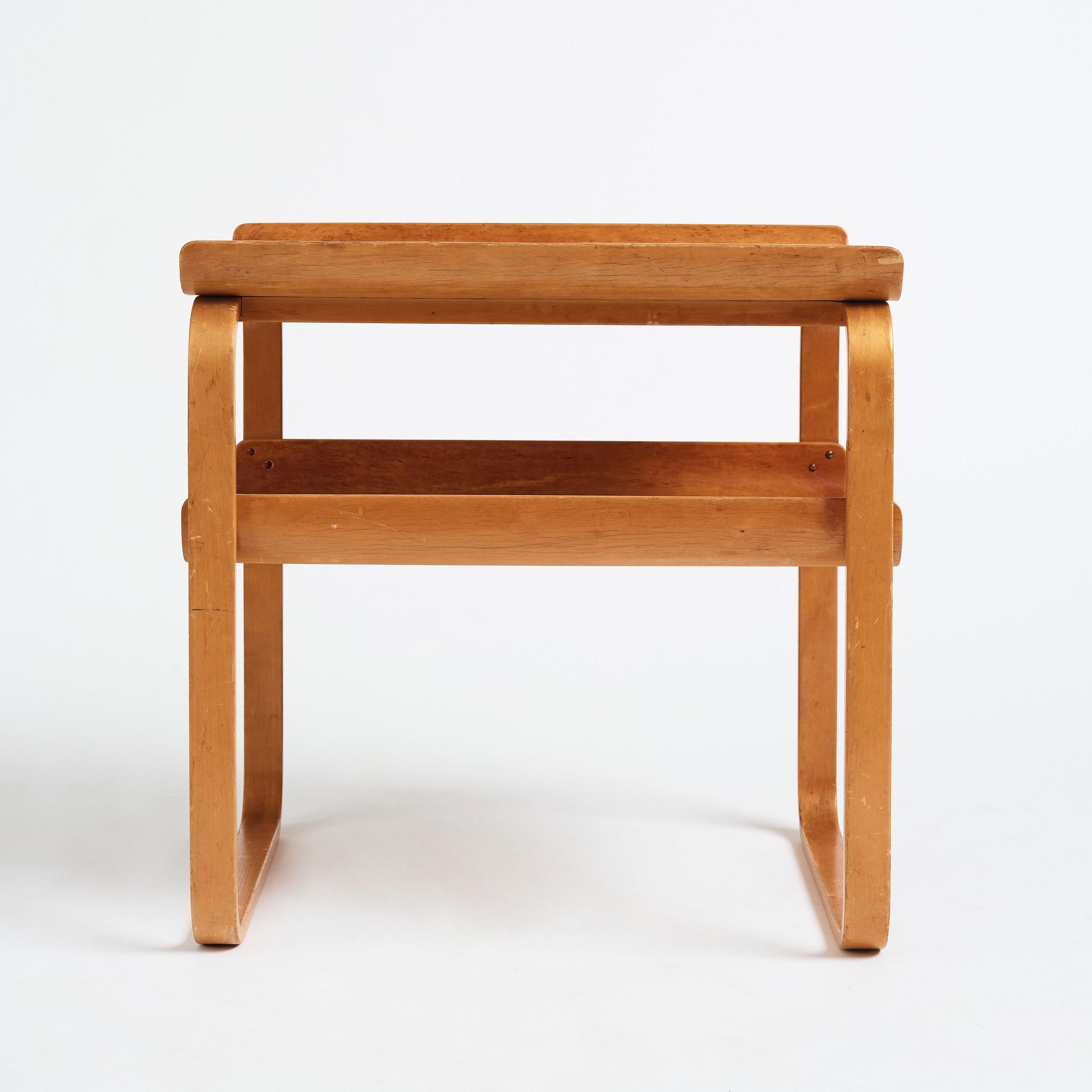 Alvar Aalto, a burled birch 'model 75' side table, Aalto Design, Hedemora, Sweden 1946-56.