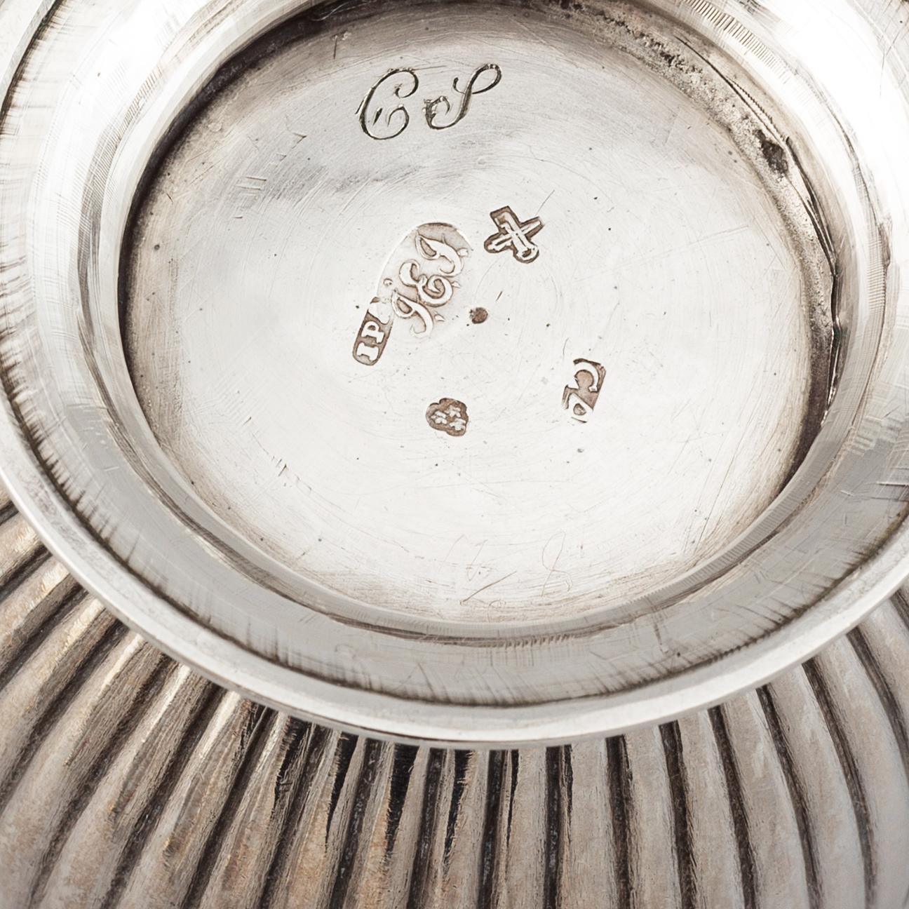 A silver creamer by Johan Petter Ahlforss, Strängnäs, 1833 and a silver sugar box, Kristianstad, 1928.