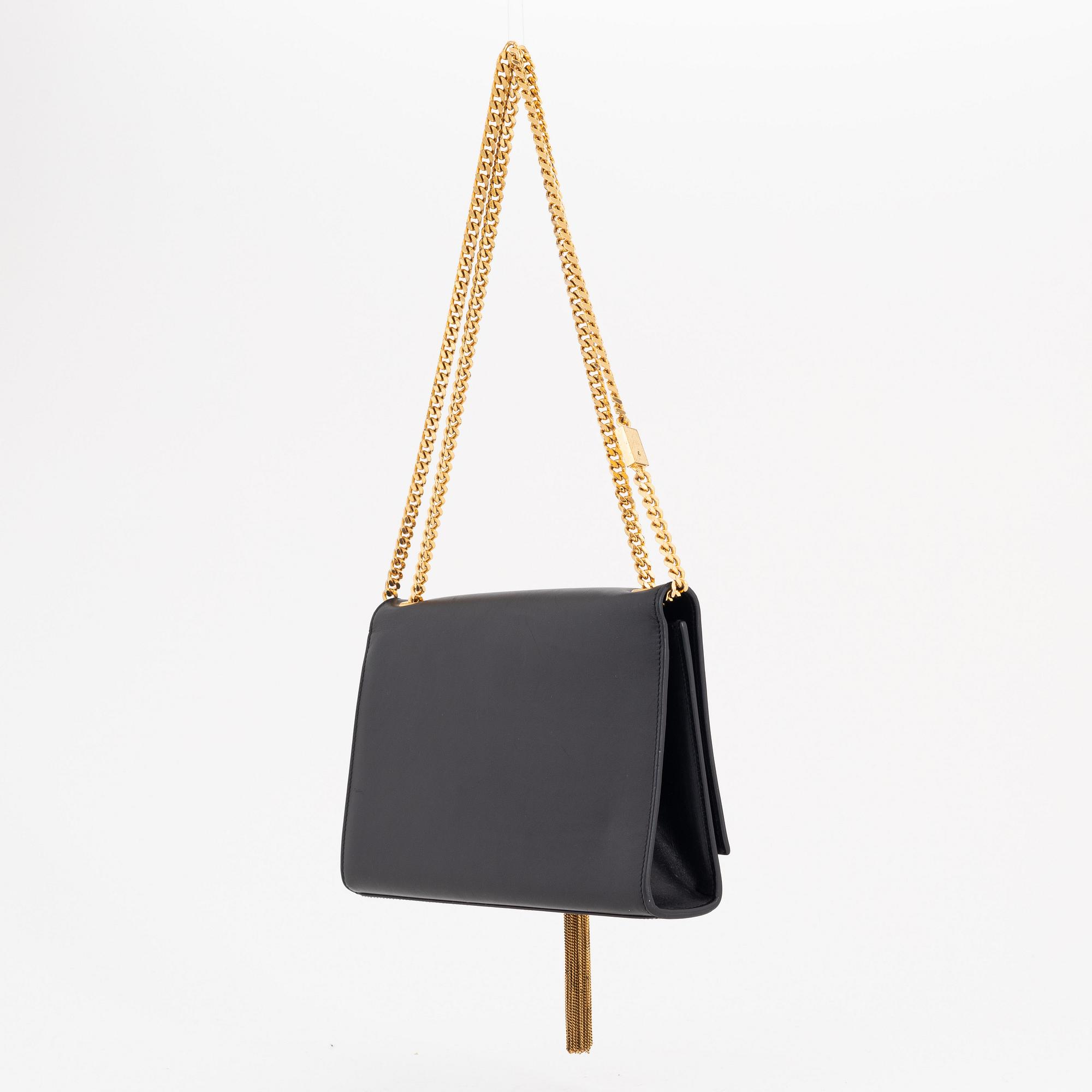 Yves Saint Laurent, a black smooth leather 'Kate' handbag.