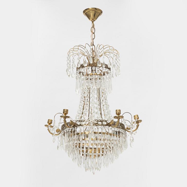 An Empire style chandelier, later part of the 20th Century.