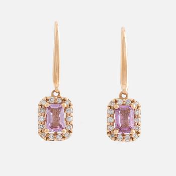 Earrings with pink sapphires and diamonds.