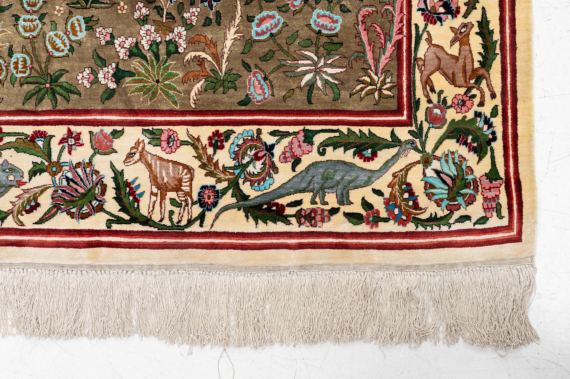 A silk Qum rug, central Persia, c. 213 x 135 cm.